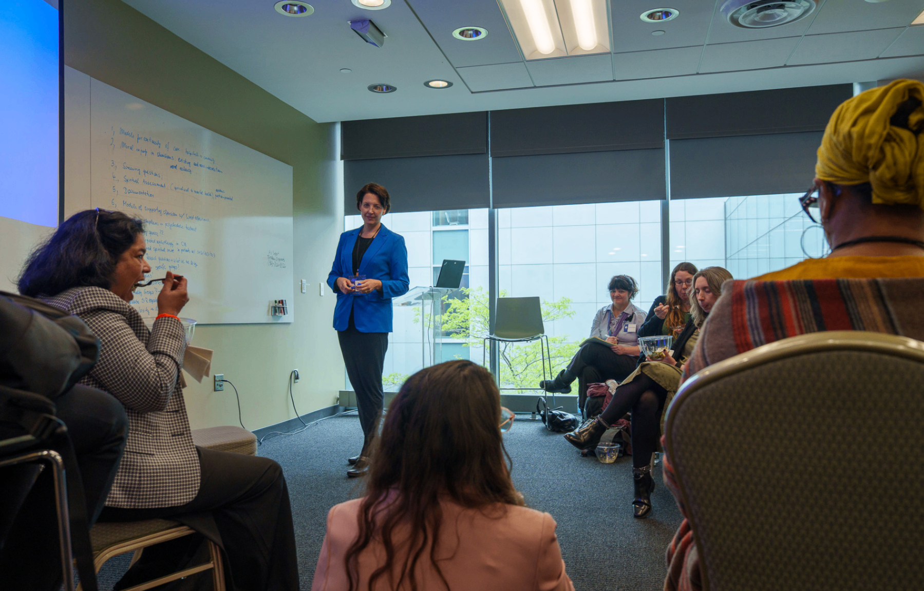Workshop session with participants gathered in a classroom setting
